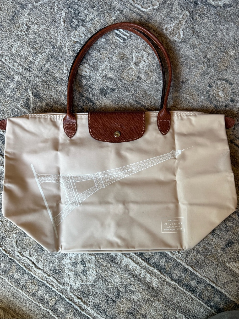 Longchamp Beige Tote with Brown Leather Trim and Eiffel Tower Print